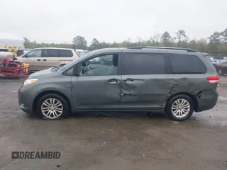 2013 Toyota Sienna XLE AAS with VIN 5TDYK3DC8DS401561, listed as a IAAI auction lot 41990044 with 214,111 mi miles and . Bid and sale history available at DreamBid. Image 14.