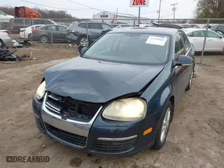 2006 Volkswagen Jetta Sedan 1.9L TDI with VIN 3VWST71K56M032034, listed as a IAAI auction lot 41498486 with 137,573 mi miles. Bid and sale history available at carsss.com. Image 17.