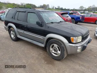 2000 Infiniti QX4 with VIN JNRAR07Y0YW086005, listed as a IAAI auction lot 41882509 with 183,257 mi miles and . Bid and sale history available at DreamBid. Image 1.