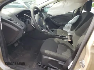 2017 Ford Focus SE z VIN 1FADP3F24HL291870, wystawiony jako Copart lot #60851275 z przebiegiem 83 334 mil mil oraz Szkoda całkowita • Salvage title. Historia ofert i sprzedaży dostępna na DreamBid. Obrazek 7.