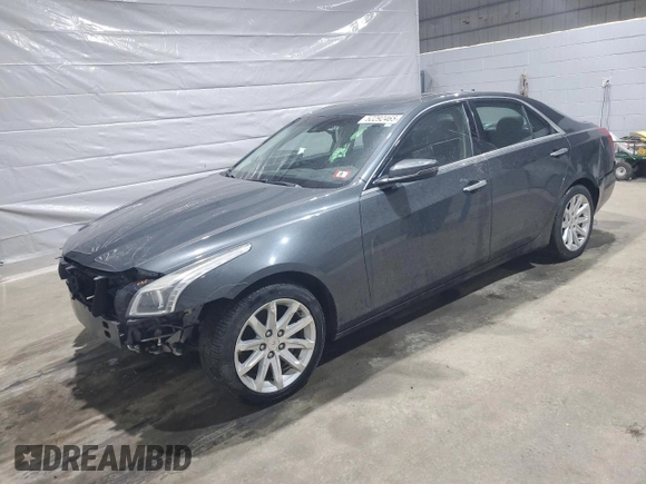 2014 Cadillac CTS Luxury AWD z VIN 1G6AX5SX5E0185132, wystawiony jako Copart lot #52292465 z przebiegiem 69 344 mil mil oraz Szkoda całkowita • Salvage title. Historia ofert i sprzedaży dostępna na DreamBid. Obrazek 1.