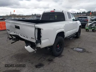 2022 Toyota Tacoma SR with VIN 3TYSX5EN1NT010664, listed as a IAAI auction lot 41642295 with 29,848 mi miles and . Bid and sale history available at DreamBid. Image 4.