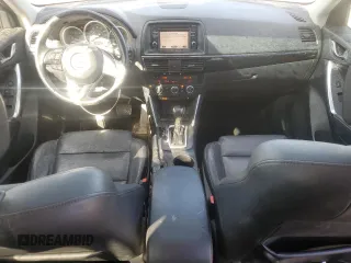 2015 Mazda CX-5 Grand Touring with VIN JM3KE4DY4F0457962, listed as a Copart auction lot 48061685 with 96,379 mi miles and Clean Title. Bid and sale history available at carsss.com. Image 8.