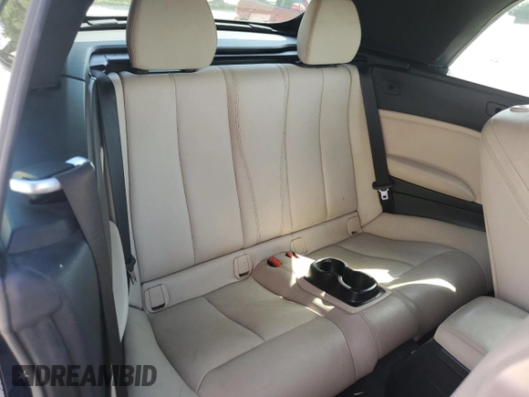 2016 BMW 2 Series 228i xDrive with VIN WBA1L9C50GV324969, listed as a Copart auction lot 72618854 with 71,300 mi miles and Salvage Title. Bid and sale history available at carsss.com. Image 10.