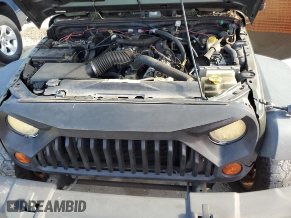 2008 Jeep Wrangler Unlimited X with VIN 1J4GA39118L633877, listed as a Copart auction lot 63652795 with 129,856 mi miles and Clean title. Bid and sale history available at DreamBid. Image 11.