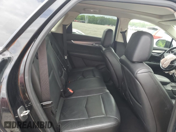 2019 Cadillac XT5 Luxury FWD с VIN 1GYKNCRS7KZ104400, выставлен на аукционе Copart как лот 58704715 с пробегом 80 676 миль миль и Списание • Salvage title. История ставок и продаж доступна на DreamBid. Изображение 11.