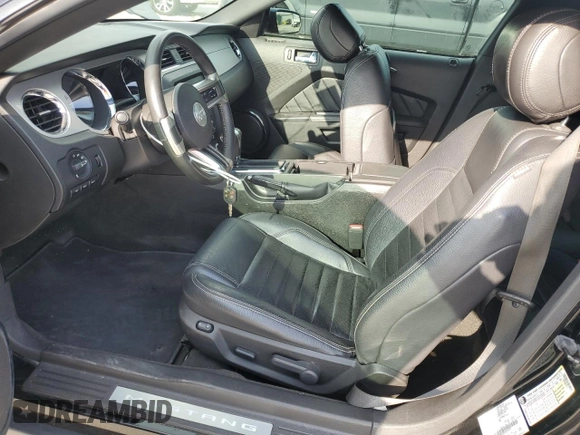 2012 Ford Mustang GT Premium with VIN 1ZVBP8CF0C5251771, listed as a Copart auction lot 50801515 with 104,833 mi miles and Salvage Title. Bid and sale history available at DreamBid. Image 7.