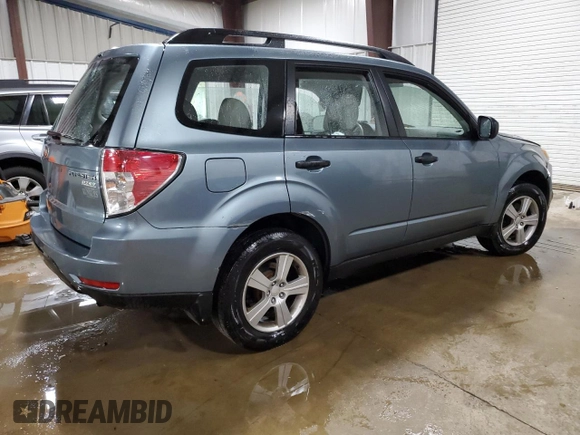 2011 Subaru Forester X z VIN JF2SHABC7BH747289, wystawiony jako Copart lot #57037115 z przebiegiem 85 324 mil mil oraz Szkoda całkowita • Salvage title. Historia ofert i sprzedaży dostępna na DreamBid. Obrazek 3.