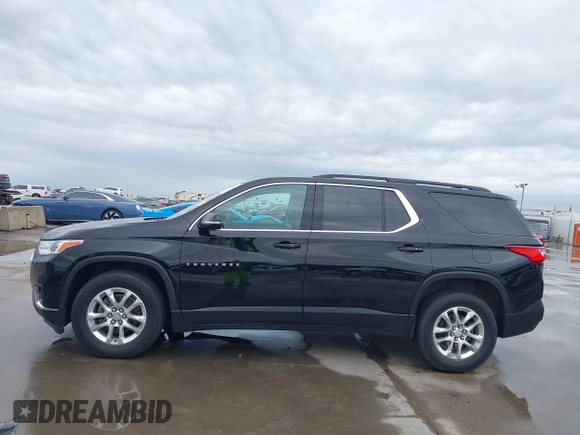 2020 Chevrolet Traverse LT Cloth with VIN 1GNERGKW9LJ300910, listed as a IAAI auction lot 41948213 with 64,972 mi miles and . Bid and sale history available at DreamBid. Image 14.