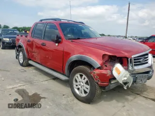 2010 Ford Explorer Sport Trac XLT z VIN 1FMEU3BE4AUF05128, wystawiony jako Copart lot #54847865 z przebiegiem Nie podano mil oraz Szkody całkowita. Historia ofert i sprzedaży dostępna na DreamBid. Obrazek 4.