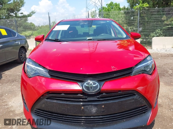 2018 Toyota Corolla L with VIN 2T1BURHE7JC105479, listed as a IAAI auction lot 42540566 with 67,487 mi miles and . Bid and sale history available at DreamBid. Image 12.