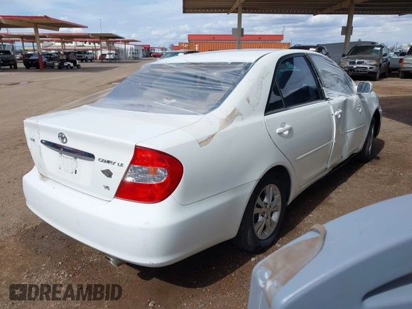2004 Toyota Camry LE with VIN 4T1BF30K54U071960, listed as a IAAI auction lot 41513417 with 165,738 mi miles. Bid and sale history available at carsss.com. Image 4.