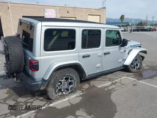 2023 Jeep Wrangler Rubicon with VIN 1C4JJXR69PW581474, listed as a IAAI auction lot 41697016 with 25,775 mi miles and . Bid and sale history available at DreamBid. Image 4.