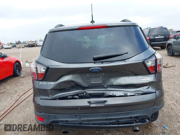 2017 Ford Escape SE with VIN 1FMCU0G99HUC65571, listed as a IAAI auction lot 41923517 with 77,179 mi miles and . Bid and sale history available at DreamBid. Image 6.