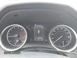 2024 Toyota Camry LE z VIN 4T1C11AK9RU228788, wystawiony jako IAAI lot #42108189 z przebiegiem 26 359 mil mil oraz . Historia ofert i sprzedaży dostępna na DreamBid. Obrazek 7.