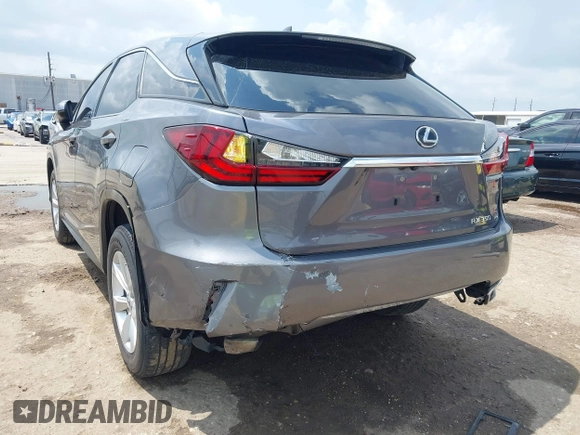 2016 Lexus RX 350 z VIN 2T2ZZMCAXGC031079, wystawiony jako IAAI lot #42120190 z przebiegiem 142 407 mil mil oraz . Historia ofert i sprzedaży dostępna na DreamBid. Obrazek 6.