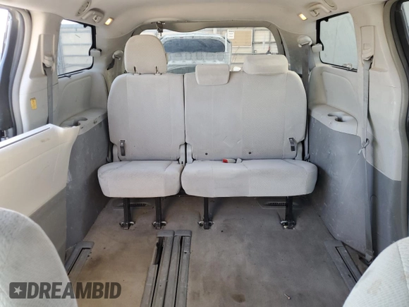 2012 Toyota Sienna LE AAS with VIN 5TDKK3DC8CS259085, listed as a Copart auction lot 73592584 with 198,370 mi miles and Salvage Title. Bid and sale history available at DreamBid. Image 10.
