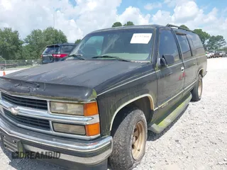 1996 Chevrolet Suburban with VIN 3GNEC16R3TG120004, listed as a IAAI auction lot 42752410 with 291,491 mi miles and . Bid and sale history available at DreamBid. Image 6.