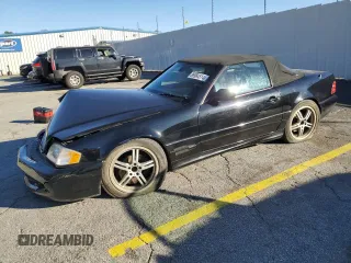1999 Mercedes-Benz SL-Class with VIN WDBFA68F0XF175888, listed as a Copart auction lot 85984514 with 97,975 mi miles and Salvage Title. Bid and sale history available at carsss.com. Image 1.