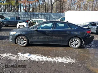 2020 Ford Fusion SE z VIN 3FA6P0LU4LR158954, wystawiony jako IAAI lot #41474425 z przebiegiem 76 966 mil mil oraz . Historia ofert i sprzedaży dostępna na DreamBid. Obrazek 14.