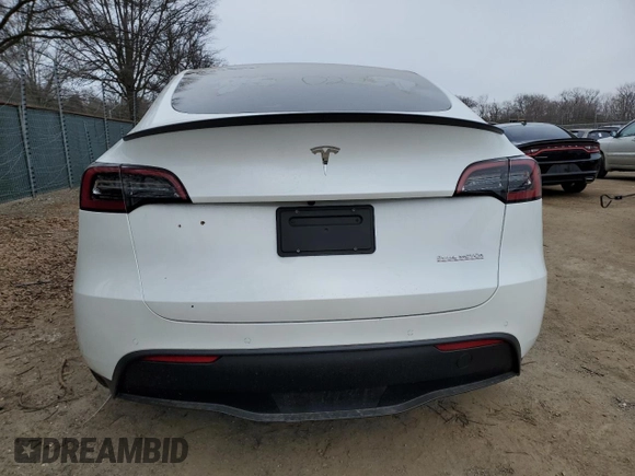 2022 Tesla Model Y Performance with VIN 7SAYGDEF7NF311990, listed as a Copart auction lot 43705395 with 25,651 mi miles and Salvage Title. Bid and sale history available at DreamBid. Image 6.