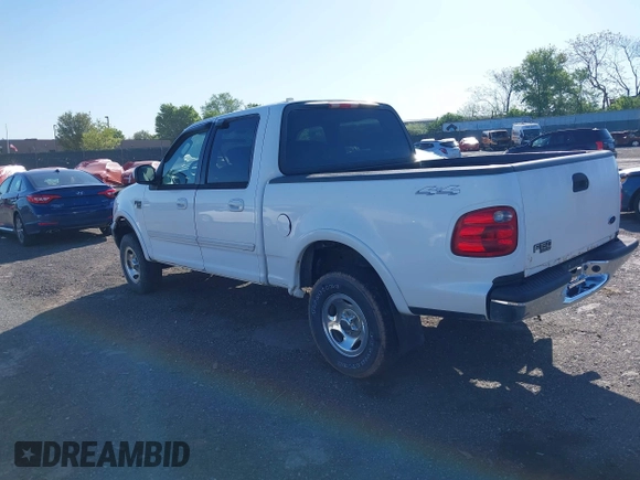 2003 Ford F-150 XLT with VIN 1FTRW08633KD11896, listed as a IAAI auction lot 42137360 with 118,654 mi miles. Bid and sale history available at carsss.com. Image 3.