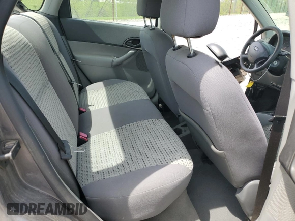 2007 Ford Focus S z VIN 1FAHP34N17W103625, wystawiony jako Copart lot #55300395 z przebiegiem 82 041 mil mil oraz Szkoda całkowita • Salvage title. Historia ofert i sprzedaży dostępna na DreamBid. Obrazek 10.