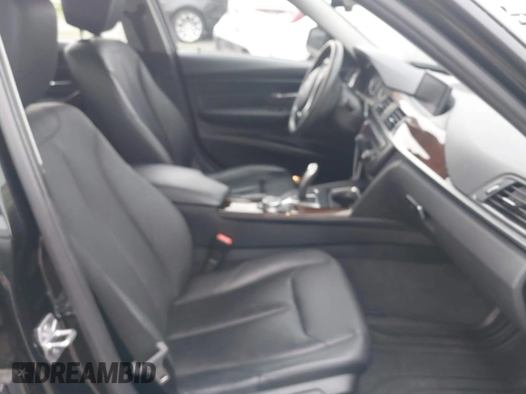 2015 BMW 3 Series 328i xDrive with VIN WBA3B3C57FF547110, listed as a IAAI auction lot 41870141 with 49,412 mi miles and . Bid and sale history available at carsss.com. Image 5.
