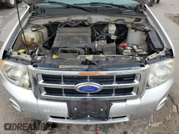 2011 Ford Escape XLT с VIN 1FMCU9DG8BKC62302, выставлен на аукционе Copart как лот 58240715 с пробегом 159 739 миль миль и Списание • Salvage title. История ставок и продаж доступна на DreamBid. Изображение 12.
