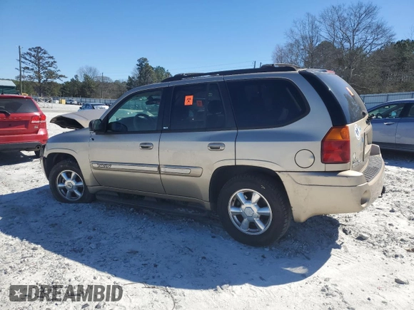 2004 GMC Envoy SLT with VIN 1GKDS13S942169804, listed as a Copart auction lot 47439305 with 240,348 mi miles and Salvage Title. Bid and sale history available at carsss.com. Image 2.
