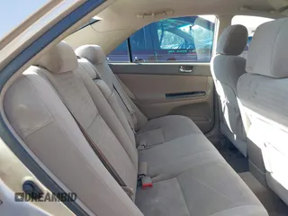 2006 Toyota Camry LE z VIN 4T1BF32K16U118594, wystawiony jako IAAI lot #41558030 z przebiegiem 275 360 mil mil oraz . Historia ofert i sprzedaży dostępna na DreamBid. Obrazek 8.