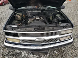 1999 Chevrolet Tahoe with VIN 1GNEC13R3XJ325377, listed as a Copart auction lot 83991974 with 257,816 mi miles and Salvage Title. Bid and sale history available at carsss.com. Image 12.