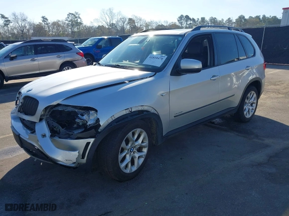2011 BMW X5 35i with VIN 5UXZV4C5XBL412661, listed as a IAAI auction lot 41810470 with 168,470 mi miles. Bid and sale history available at carsss.com. Image 2.