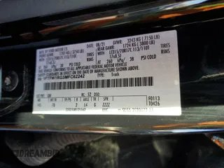 2021 Ford F-150 Raptor with VIN 1FTFW1RG3MFC62242, listed as a Copart auction lot 85596594 with 33,497 mi miles and Salvage Title. Bid and sale history available at carsss.com. Image 12.