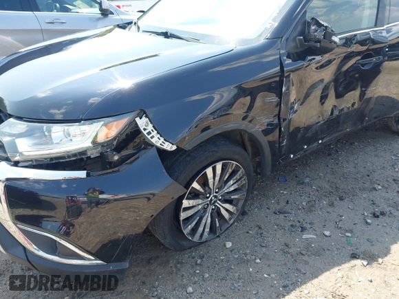 2019 Mitsubishi Outlander SE with VIN JA4AD3A33KZ005401, listed as a IAAI auction lot 42270895 with 58,080 mi miles and . Bid and sale history available at DreamBid. Image 6.