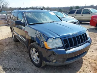 2010 Jeep Grand Cherokee Laredo with VIN 1J4PS4GK0AC112654, listed as a IAAI auction lot 41809445 with 418,301 mi miles. Bid and sale history available at carsss.com. Image 1.