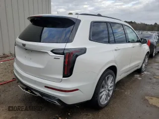 2021 Cadillac XT6 AWD Sport z VIN 1GYKPHRS4MZ209583, wystawiony jako Copart lot #66305562 z przebiegiem 19 570 mil mil oraz . Historia ofert i sprzedaży dostępna na DreamBid. Obrazek 4.