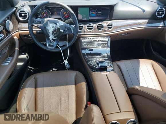 2017 Mercedes-Benz E 300 Luxury with VIN WDDZF4KB2HA061308, listed as a Copart auction lot 60214295 with 97,317 mi miles and Salvage title. Bid and sale history available at DreamBid. Image 8.