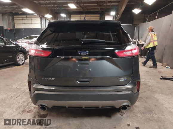 2020 Ford Edge SEL z VIN 2FMPK4J93LBA55165, wystawiony jako IAAI lot #42346860 z przebiegiem 72 201 mil mil oraz . Historia ofert i sprzedaży dostępna na DreamBid. Obrazek 16.