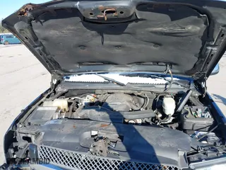 2005 Chevrolet Avalanche Z71 with VIN 3GNEK12ZX5G210052, listed as a IAAI auction lot 41327694 with 145,716 mi miles. Bid and sale history available at carsss.com. Image 10.