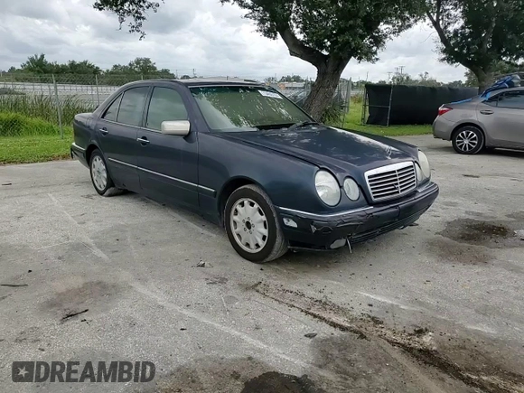 1997 Mercedes-Benz E-Class with VIN WDBJF55F4VJ025769, listed as a Copart auction lot 73460164 with 0 mi miles and Salvage Title. Bid and sale history available at carsss.com. Image 10.