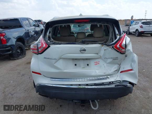2015 Nissan Murano SL z VIN 5N1AZ2MH5FN213233, wystawiony jako IAAI lot #41869124 z przebiegiem 125 104 mil mil oraz . Historia ofert i sprzedaży dostępna na DreamBid. Obrazek 16.