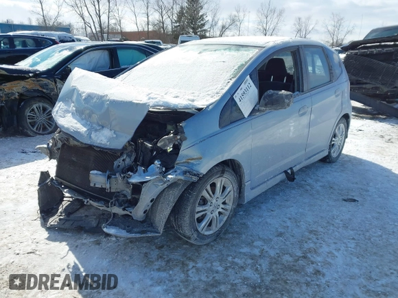2009 Honda Fit Sport with VIN JHMGE884X9S026613, listed as a IAAI auction lot 41593112 with 144,736 mi miles. Bid and sale history available at carsss.com. Image 17.
