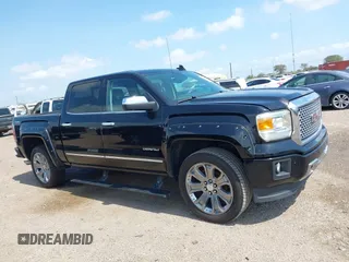 2015 GMC Sierra 1500 Denali z VIN 3GTU2WEJ9FG386812, wystawiony jako IAAI lot #42381651 z przebiegiem 138 009 mil mil oraz . Historia ofert i sprzedaży dostępna na DreamBid. Obrazek 13.