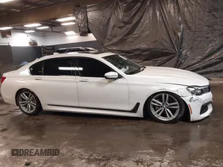 2019 BMW 7 Series 740i xDrive with VIN WBA7E4C59KGV70391, listed as a IAAI auction lot 41531991 with 70,017 mi miles and . Bid and sale history available at carsss.com. Image 13.