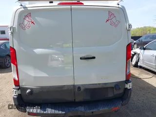 2015 Ford Transit with VIN 1FTNE2YM7FKB00894, listed as a IAAI auction lot 42088996 with 199,321 mi miles and . Bid and sale history available at DreamBid. Image 16.