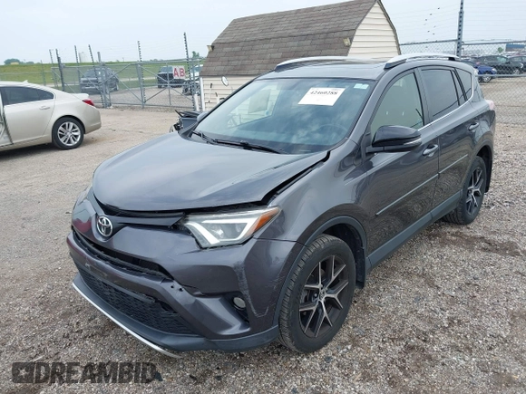 2016 Toyota RAV4 SE z VIN JTMJFREV9GJ069074, wystawiony jako IAAI lot #42460288 z przebiegiem 151 039 mil mil oraz . Historia ofert i sprzedaży dostępna na DreamBid. Obrazek 2.