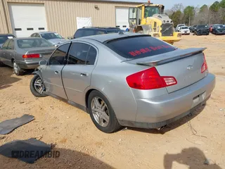 2003 Infiniti G35 z VIN JNKCV51E53M334588, wystawiony jako IAAI lot #41795156 z przebiegiem 99 906 mil mil oraz . Historia ofert i sprzedaży dostępna na DreamBid. Obrazek 3.