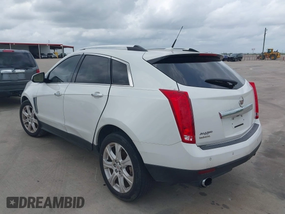 2014 Cadillac SRX Premium Collection with VIN 3GYFNDE31ES615995, listed as a IAAI auction lot 42148943 with 232,752 mi miles and . Bid and sale history available at DreamBid. Image 3.