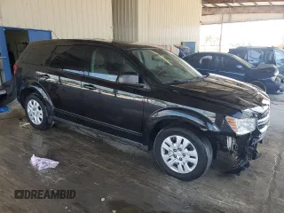 2013 Dodge Journey American Value with VIN 3C4PDCAB2DT684871, listed as a Copart auction lot 52288915 with 119,569 mi miles and Salvage title. Bid and sale history available at DreamBid. Image 4.